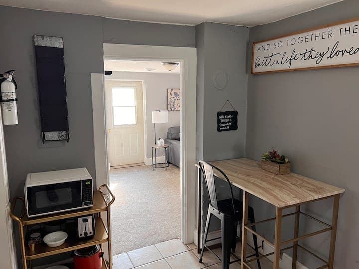 Kitchen dining nook looking into the living room