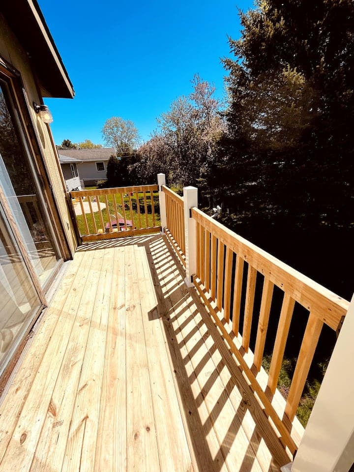Private wood deck and railing at the Sparta upper apartment