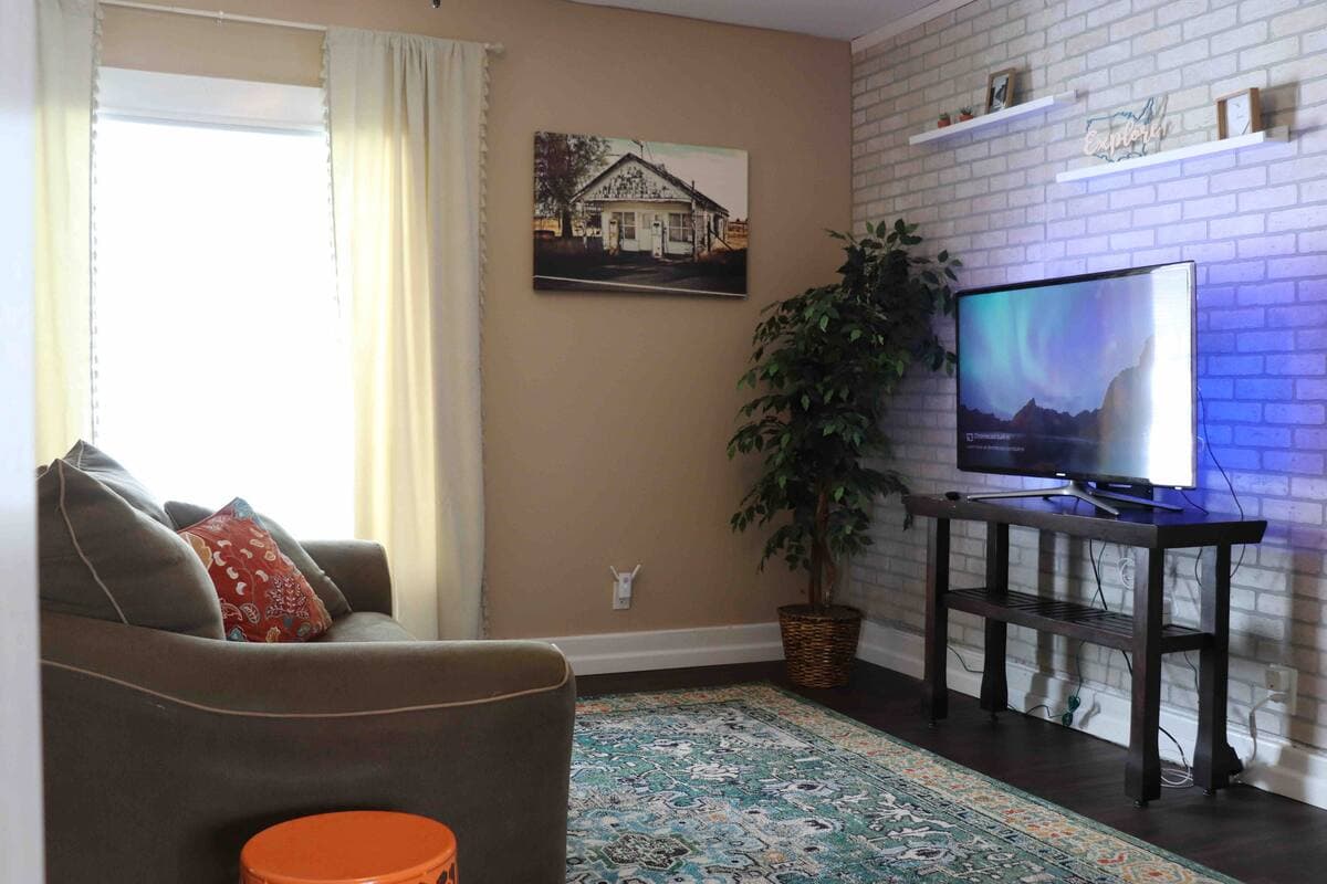 Living room window and sofa in the Tomah 1-bedroom